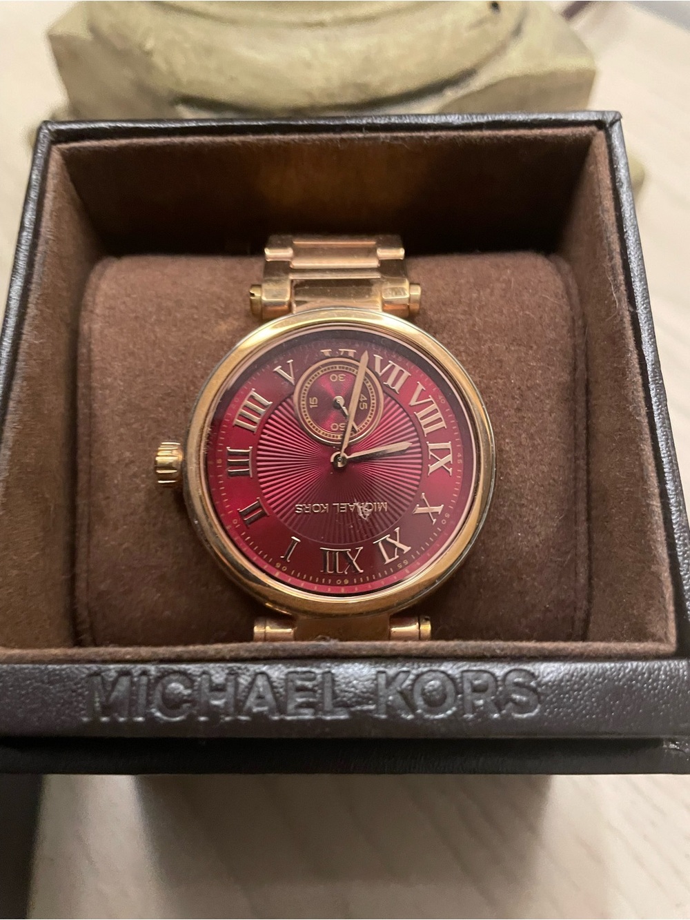 Michael Kors Gold-Tone Women’s Watch with Red Sunburst Dial